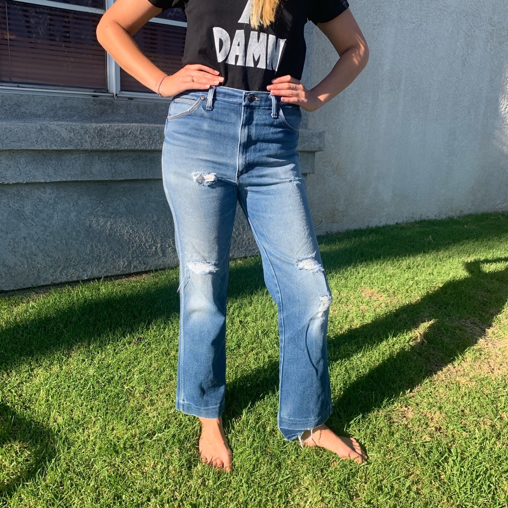 Super cool distressed Wrangler jeans